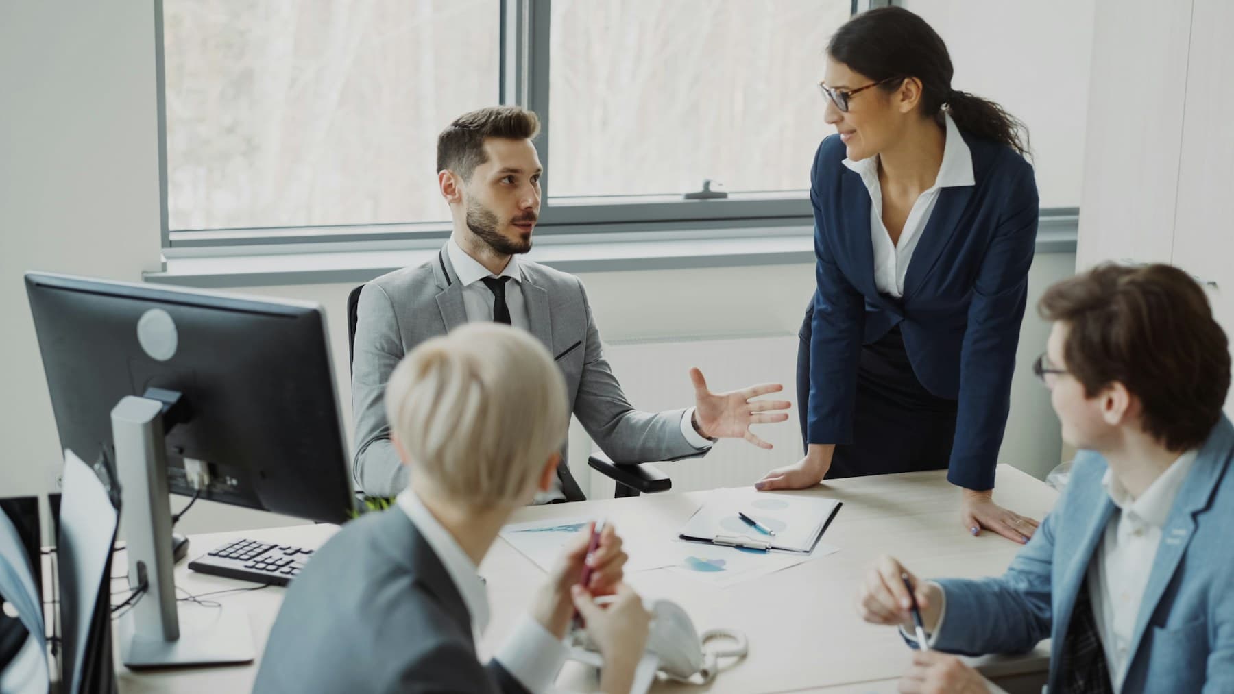Yellow Clicks team discussing client growth